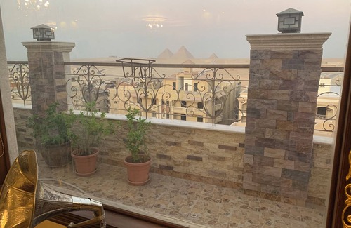 Al Haram Apartment | Spacious 3-bedroom apartment with AC, fitness room in charming Cairo giza