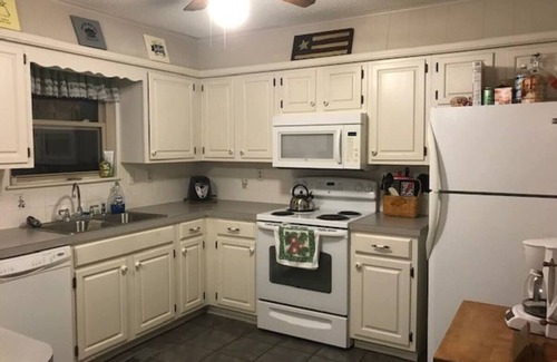 Grove House | Spacious 3 bedroom 2 bath home with large fenced in yard.