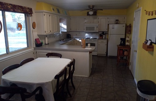 Grove House | Spacious 3 bedroom 2 bath home with large fenced in yard.
