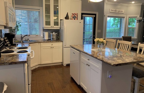 Kent House | Spacious 3 bedroom Guest home with large swim spa and a fire-pit!