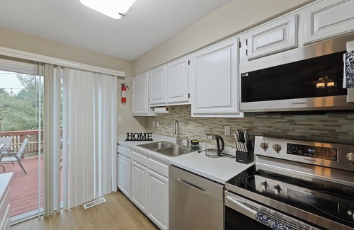 Calverton Apartment | Spacious 3BR Townhouse with Balcony & Gym