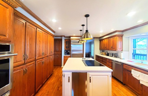 Jones Mills House | Spacious 4-bed, 3-bath home located on Lake Catherine with pool and boat dock