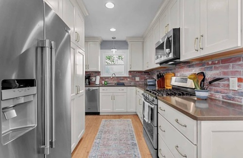 Ward Parkway House | Spacious 4 Bed Home with Backyard Oasis 52