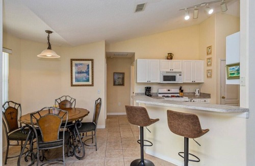 Tuscan Ridge House | Spacious 4-Bed Pool Retreat Close to Disney and Local Attractions