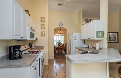 Tuscan Ridge House | Spacious 4-Bed Pool Retreat Close to Disney and Local Attractions