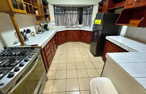 Sector 1 Nor-Oeste House | Spacious 4-bedroom house with WiFi and AC in vibrant San Pedro Sula