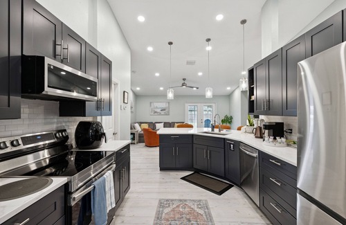 Palm Bay House | Spacious 4 bedroom, 2000 sq ft home with parking on premise.