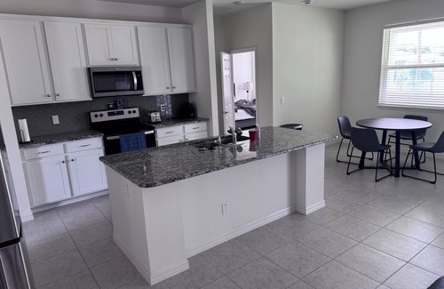 Palm Bay House | Spacious 4-bedroom house in Palm Bay, king tempur pedic bed, theatre sets big TV
