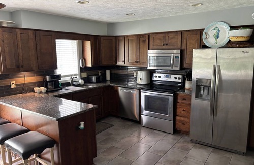 Omaha House | Spacious 4-bedroom house in amazing Omaha with WiFi, backyard oasis.