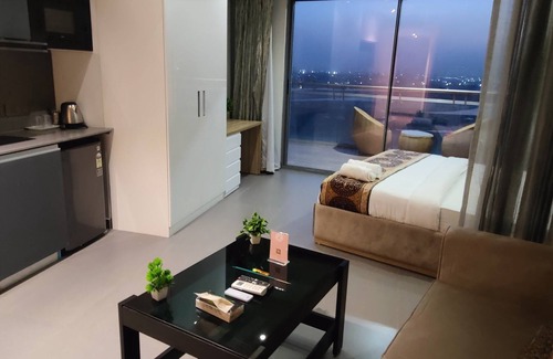 Noida Apartment | Spacious 4-bedroom studio apartments in amazing Noida with WiFi, AC