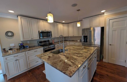Parkville House | Spacious 4-bedroom townhome with great backyard and POOL in charming Parkville