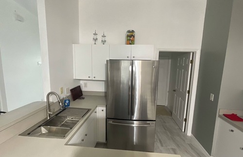 Eisenhower House | Spacious 4-bedroom house in peaceful Lehigh Acres with WiFi, AC. Newly remodeled