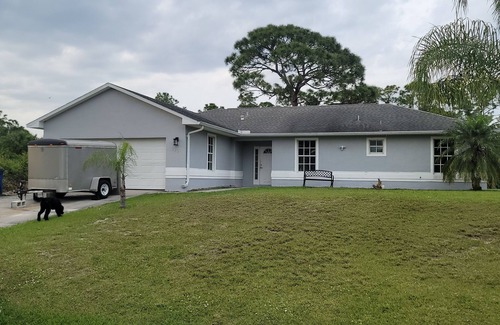 Eisenhower House | Spacious 4-bedroom house in peaceful Lehigh Acres with WiFi, AC. Newly remodeled