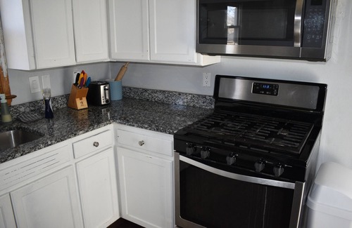 Lovington House | Spacious 4br house sleeps 10 w/game room & gym