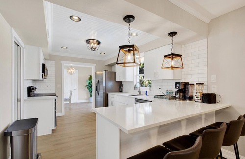 Bay Crest Park House | Spacious 5-bd 3.5bth Waterfront Retreat with Pool, Kayaks, and Game room