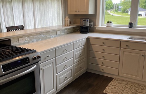 Roach House | Spacious 5 Bedroom, 3.5 Bathroom Lakeview home with a large yard awaits!