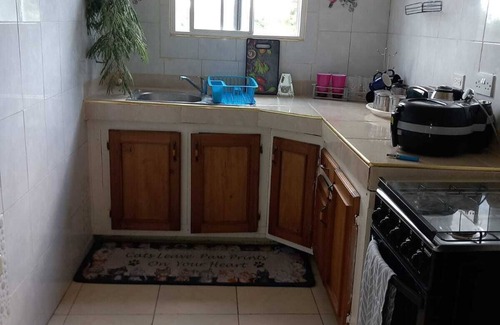 Spanish Town House | Spacious 5-bedroom estate in serene Spanish Town with WiFi, AC