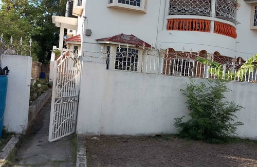 Spanish Town House | Spacious 5-bedroom estate in serene Spanish Town with WiFi, AC