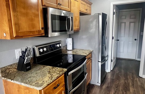 Battlefield House | Spacious 5-bedroom house with hot tub, firepit, movie room in quiet Battlefield