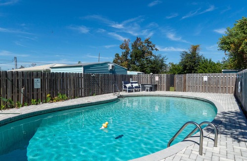 Highland City House | "Spacious 5-Bedroom Home with Versatile Living Areas and Private Pool