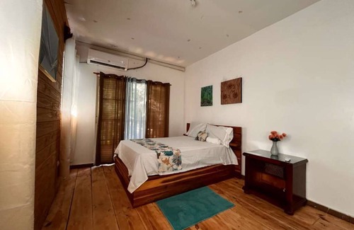 Bonao Villa | Spacious 6-bedroom villa in Tranquil Monseñor Nouel with AC
