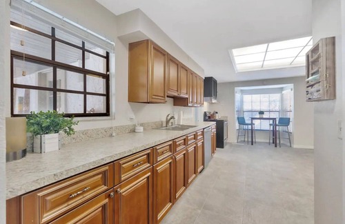 Palm Harbor House | Spacious 8-Bedroom Mansion Just 10 Minutes from Honeymoon Island Beach