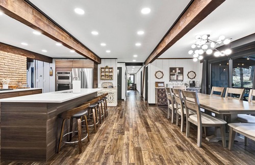 McHenry House | Spacious A-Frame sleeps 25 on 5 wooded acres with a private fishing pond
