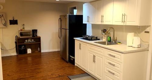 Pickering Apartment | Spacious and bright unit with natural light.