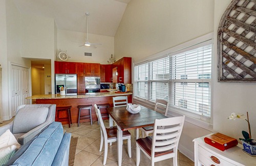 Indian Shores Condo | Spacious and family friendly with pool, dock, and just steps to the beaches