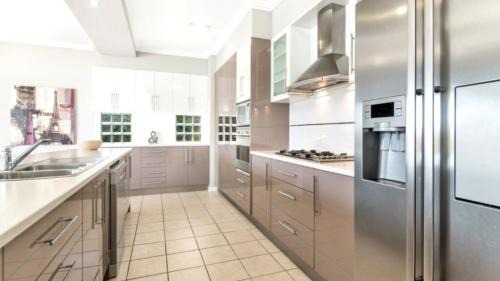 Banksia Beach House | Spacious Canal Home With Pool