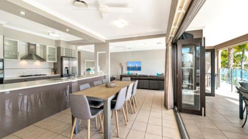 Banksia Beach House | Spacious Canal Home With Pool