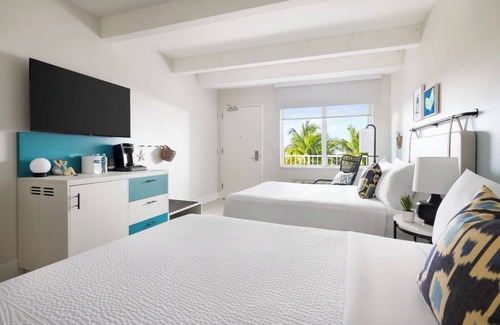 New Town Hotel | Spacious Double Queen Room with Contemporary Touches