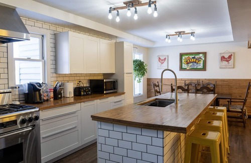 Quad Cities House | Spacious family home with luxe beds, fenced in back yard, heart of town!