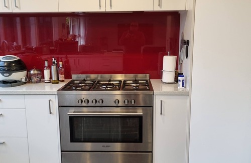 Orewa House | Spacious Family Home with deck & garden. Short walk to the beach.