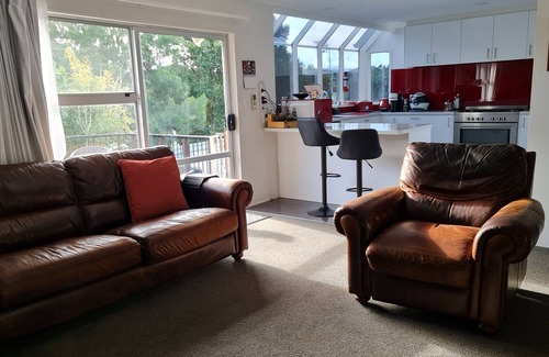 Orewa House | Spacious Family Home with deck & garden. Short walk to the beach.