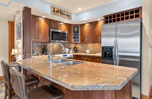 Whistler Cay Heights Condo | Spacious Family Townhome across from the Village. 2 levels, large foyer/ski room, Free parking