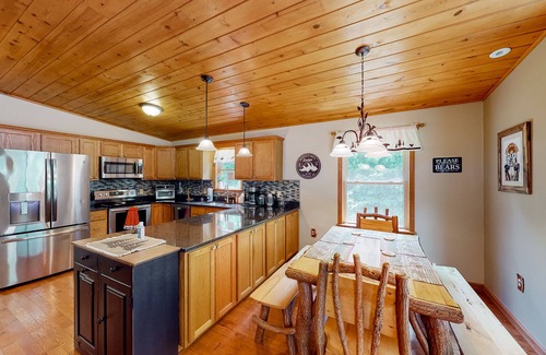 Bloomington House | Spacious forest retreat with grill, firepit, game room, & jacuzzi tub - dogs ok
