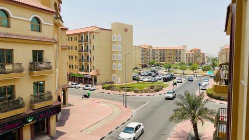 International City Apartment | Spacious Furnished studio with balcony Spain cluster International city