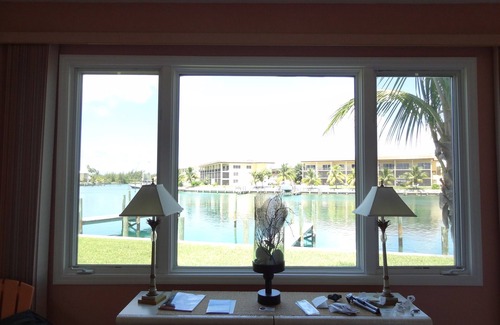 Bahamia West Condo | Spacious Gated Waterfront Villa with Private Dock