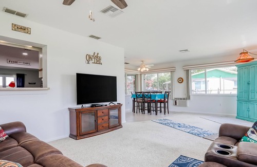 Highland House | Spacious home with water view, dock, lovely patio, central AC & washer/dryer