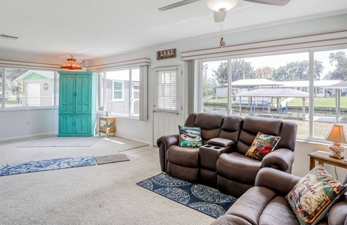 Highland House | Spacious home with water view, dock, lovely patio, central AC & washer/dryer