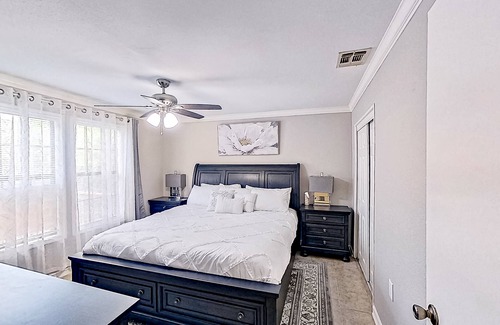 Midtown House | Spacious home with yard, deck, W/D, on-site parking & central AC