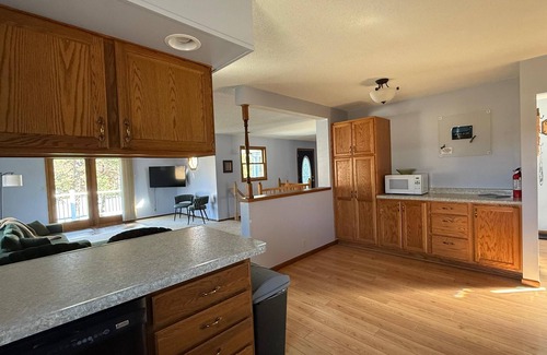 Lake Wissota House | Spacious Lakefront Home with Nostalgic Charm, Wifi, AC and a Boat Dock