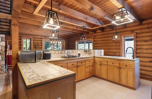 Charlevoix Ski Chalet | Spacious Log Cabin for 16+ at ThePinecrestChalet Hot tubs, air hockey, fireplace