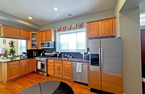 Noble Square Condo | Spacious & Modern 3BD/2BA Home- Garage Parking!