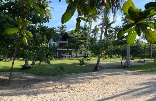 Catangnan Villa | Spacious native style house right on your own secluded beach.