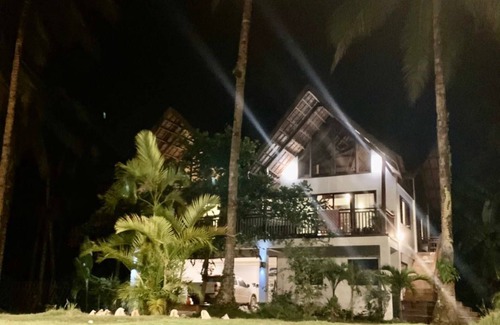 Catangnan Villa | Spacious native style house right on your own secluded beach.