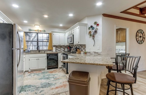Edmond House | Spacious Poolside Retreat with Shade Trees - 4 Bedrooms 2 Bathrooms