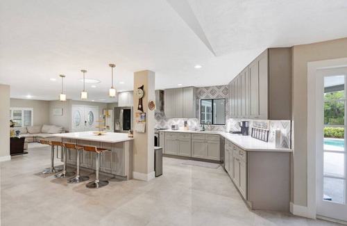 Palm Harbor House | Spacious Retreat with Heated Pool/Spa