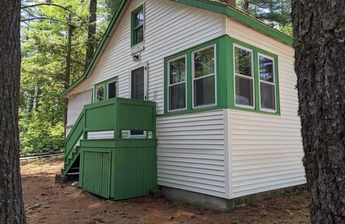 Raymond Cottage | Spacious, Rustic Retreat with a Large Screened Porch and Water Access